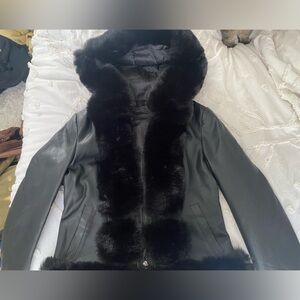 Faux leather jacket with fur black linings